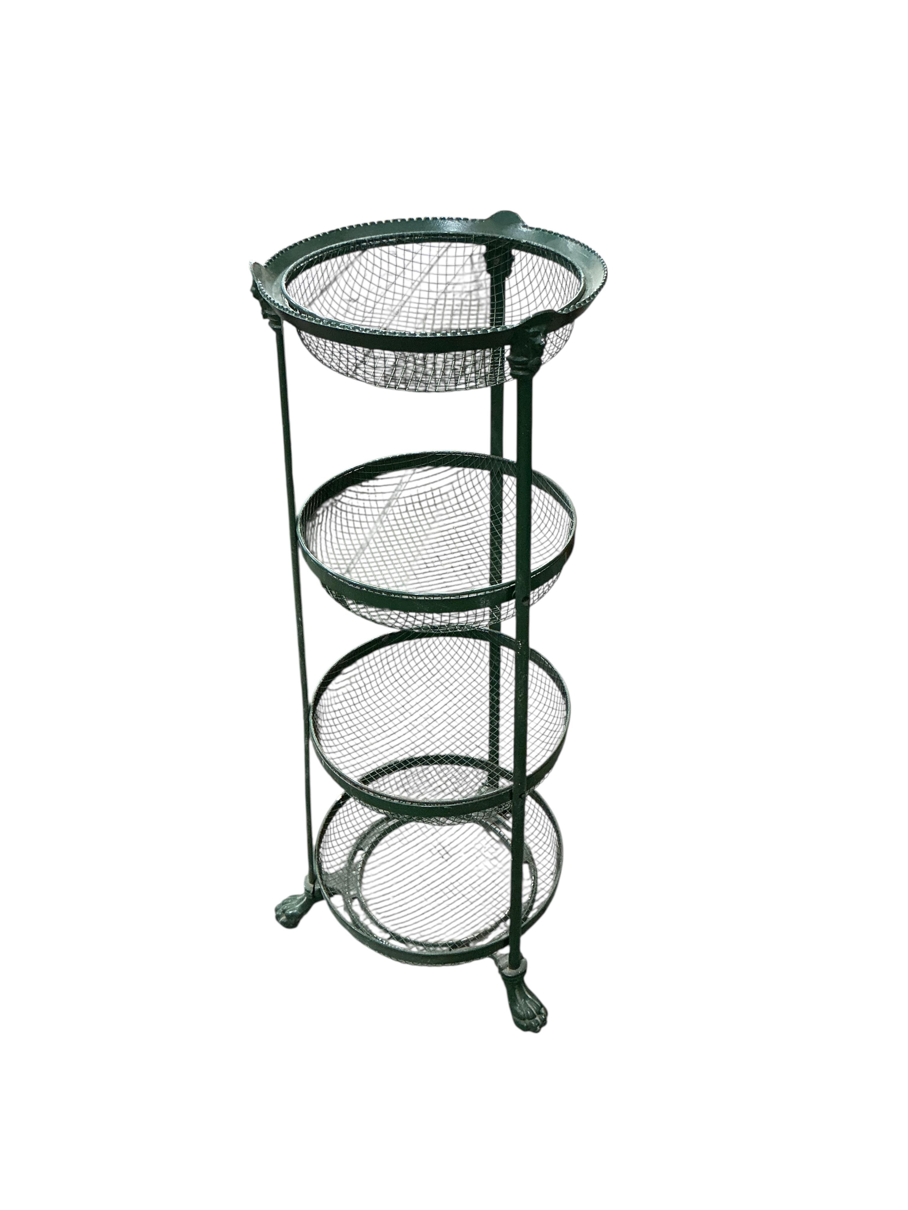 A Victorian style painted cast metal rack, height 85cm